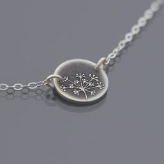 I've etched my hand drawn queen anne's lace design into a sterling silver pendant. I've oxidized and hand finished this piece to highlight the raised design and I've given it a brushed finish. This tiny pendant measures 1/2" in diameter a sterling silver chain is attached at the sides. The sterling chain is available in either an oxidized silver finish or bright silver finish. The bright silver chain is pictured. Antique Silver Etched Sterling Silver Necklace, Nature-inspired Silver Hand Stamped Jewelry, Silver Flower Pendant Jewelry Hand Stamped, Silver Hand Stamped Flower Pendant Jewelry, Silver Etched Nature-inspired Necklaces, Nature-inspired Silver Etched Necklaces, Nature-inspired Stamped Sterling Silver Jewelry, Tiny Pendant, Silver Clay