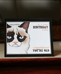 a birthday card with a grumpy cat on it