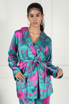 Dive into sophistication with our Aqua Blush Satin Floral Co-ord Set. This exquisite ensemble combines the serenity of aqua with the playfulness of pink in a luxurious satin fabric adorned with a delicate floral print. Let your style blossom with the delicate floral print, adding a touch of fantasy to your wardrobe. It’s a celebration of femininity and fashion. The model in the image is wearing a size M for your reference. Green Satin Summer Set, Green Satin Set For Summer, Green Satin Sets For Summer, Elegant Pink Printed Set, Feminine Silk Sets For Spring, Chic Pink Printed Sets, Pink Printed Silk Sets, Pink Floral Print Party Sets, Pink Silk Sets For Spring