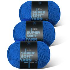 three balls of yarn with the words super soft yarn written on them in black and blue