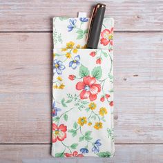 This handy pen holder is wide enough for glasses, too! Material is 100 % cotton and this lanyard can be machine washed. Size: 8 x 18 cm Looking for a matching lanyard? Check my shop: https://www.etsy.com/shop/TheFiberFlower Eye Glass Holder, Handmade Flowers Fabric, Fabric Pen, Flower Fabric, Glass Holder, Eye Glass, Eyeglass Holder, Handmade Flower, Badge Holder