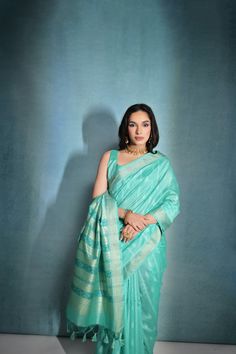 Fabric : Raw Silk Color : Turquoise Length : 5.5 Meter Saree + 0.80 Meter Blouse Saree Work : Ikkat Woven All Over Border : Zari Woven Border Wash : Dry Clean Only Product color may little differ as per the brightness or color settings of your device. Dress Saree, Raw Silk Saree, Traditional Saree, Blouse Saree, Designer Kurti, Ethnic Looks, Smart Dress, Wedding Function, Tussar Silk Saree