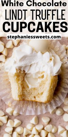 a close up of a cupcake with whipped cream on top and the words white chocolate lind truffle cupcakes above it