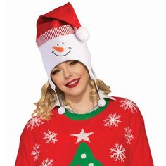 a woman wearing a snowman sweater and hat