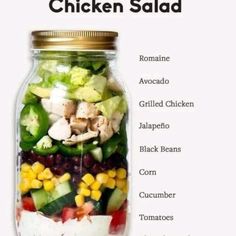 a mason jar filled with different types of food and the words southwest chicken salad in it