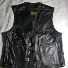 Harley-Davidson Men's Eagle Black Leather Vest Size Small Length From Top To Bottom: 25" Chest: 32" Gucci Coat, Black Leather Vest, Black Cowboy Boots, Harley Davidson Jacket, Black Cowboy, Eagle Black, Harley Davidson Men, Canvas Clutch, Local Area