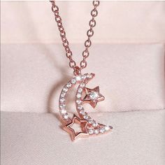 Rose Gold Plated Moon & Stars Pendant Necklace. New Condition And Comes In A Gift Box. Metal Type ~ Rose Gold Plated Over Base Metal Brass Gemstone Type ~ Cubic Zirconia Bundle & Save: Bundle 2 Or More Items For A Private Discount Next Day Shipping On All Orders 5 Star Rated Poshmark Ambassador Elegant Star-shaped Jewelry For Valentine's Day, Elegant Star-shaped Valentine's Day Jewelry, Rose Gold Moon Necklace For Gift, Rose Gold Star Jewelry For Parties, Rose Gold Star-shaped Party Jewelry, Pink Moon-shaped Jewelry Gift, Celestial Rose Gold Necklace As Gift, Pink Moon Shaped Jewelry Gift, Jewelry Rose Gold