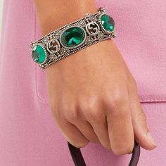 Bracelet is crafted in Italy with the namesake motif interspersed with flowers - an archival tradition of the house - punctuated with faceted green crystals, and secures with a tiger - head bayonet fastening, for a sense of old-world elegance.Sterling silverMaximum width of band 1.1in/2.9cm Maximum width of opening 2.4in/6cm Inner width when closed 2.4in/6cmMade in Italy Luxury Green Oval Bracelet, Designer Green Jewelry For Formal Occasions, Designer Jeweled Jewelry Gift, Designer Green Jewelry As A Gift, Designer Green Jewelry For Gifts, Designer Green Jewelry As Gift, Luxury Metal Bracelets With Jewels, Luxury Jeweled Crystal Bracelets, Silver Luxury Crystal Bracelet