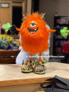 a close up of a stuffed animal on a table