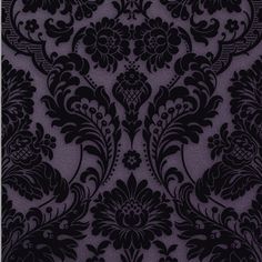 a black and purple wallpaper with an ornate design on it's side,