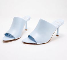 When you want height, but a wedge feels too casual, slip into these walkable heeled mules to level-up your look (without the wobble). From Vince Camuto.\n\nOriginal item is A594321. This product may be a customer return, vendor sample, or on-air display and is not in its originally manufactured condition. It may not be new. In some instances, these items are repackaged by QVC. Summer Almond Toe Mules With Reinforced Heel, Spring Wedge Heel Mules With Reinforced Heel, Spring Mules With Reinforced Heel And Wedge Shape, Spring High Heel Mules With Heel Loop, Spring Wedge Heel Mules With Padded Heel, Spring Almond Toe Mules With Heel Loop, Spring Slip-on Mules With Heel Loop, Blue Mules With Sculpted Heel For Party, Spring Slip-on Mules With 4-inch Heel