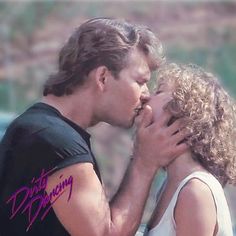 a man and woman kissing each other in front of a mountain side background with the words dirty dancing written on it