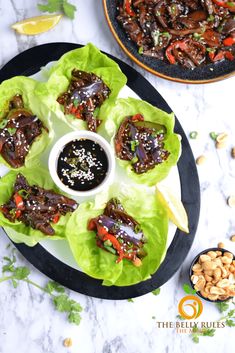 lettuce wraps with dipping sauce on a plate