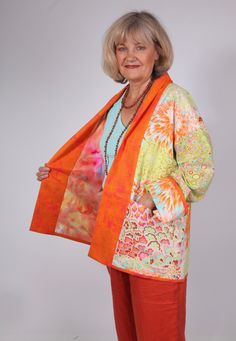 Bright, colourful Kimono Jacket in Kaffe Fassett print cotton fabrics.  Dropped shoulder style, turned back collar/front band. Turned back contrasting sleeve cuffs.  Two roomy  patch pockets. Lined in multi-dyed cotton fabric. Hems bound with cotton fabric.  Size: Small 10 -12 Back length: 71cm    28" One only in this colourway. All my jackets and coats are unique one offs. I am drawn to collecting various fabrics in small quantities. The colours or prints will speak to me as here in the bright, Multicolor Cotton Outerwear For Summer, Orange Patchwork Outerwear For Spring, Multicolor Relaxed Fit Cotton Outerwear, Multicolor Cotton Outerwear With Pockets, Multicolor Cotton Outerwear For Spring, Spring Multicolor Cotton Outerwear, Fitted Multicolor Cotton Outerwear, Fitted Cotton Patchwork Outerwear, Speak To Me