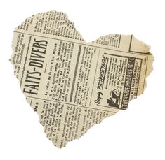 an old newspaper heart with the word lion winner written on it in black and white