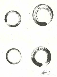 four circles drawn in black ink on white paper