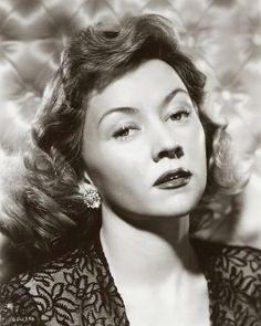 a black and white photo of a woman