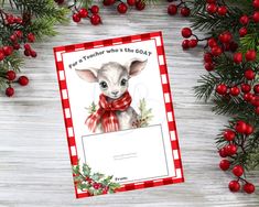 a christmas card with an image of a baby goat wearing a red bow on it