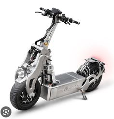 an electric scooter is shown with the light on it's seat and handlebars