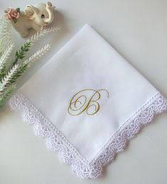 "Personalized embroidered handkerchief is a perfect gift! This handkerchief is made from cotton, lace and measure approximately 14\"x14\" (35cm x 35cm).  The letter is about 1.5''x2'' or  4/6 cm. The embroidery is made with Madeira and Gunold embroidery threads (Germany). All orders are wrapped in a white envelope with a satin ribbon. All custom orders can't be refund, but please contact me if you have questions or problems!  The item's color may be different depending on your monitor settings." Classic Handkerchiefs With Lace Trim As Gift, Elegant Machine Embroidered Handkerchiefs For Gifts, Elegant Lace Work Handkerchiefs Gift, Elegant White Handkerchiefs With Machine Embroidery, White Monogrammed Handkerchiefs For Gift, White Monogrammed Handkerchiefs As Gift, White Monogram Handkerchiefs As Gift, Elegant White Handkerchiefs With Initials, Cotton Handkerchiefs With Lace Trim For Wedding