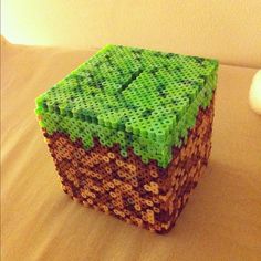 a green and brown object sitting on top of a table