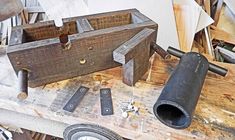 some tools are laying out on a workbench in the process of being made