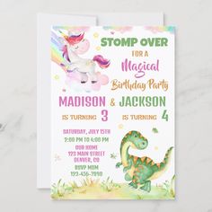 a birthday party with a dinosaur and unicorn on it