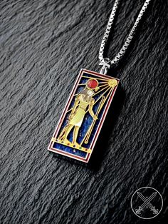 I'm always fascinated by Egyptian Mythology, history and also hieroglyphics. This time, I wanted to create a special necklace dedicated to Egyptian God Ra. I wanted to combine this beautiful pendant with a Lapis Lazuli stone. ( explanation about the photo with two pendants : the other pendant is the Horus version of this one and it's sold separately. The photo is only to show the similarities of the designs. You can find the Horus version in our shop in a separate listing). I thought the best way to honor Ra and to craft a pendant about him is to represent him with his image in ancient hieroglyphics. I love hıs hawk-human form and meaning behind it. Ra, also known as Re, was one of the most important deities in the ancient Egyptian pantheon. He was considered the creator and ruler of the w Collectible Spiritual Rectangular Jewelry, Spiritual Rectangular Pendant Jewelry For Collectors, Collectible Spiritual Jewelry With Rectangular Pendant, Spiritual Collectible Rectangular Pendant Jewelry, Ra Symbol, Etched Rectangular Pendant Spiritual Necklace, Egyptian Pantheon, Egyptian God Ra, Egyptian Ankh Necklace