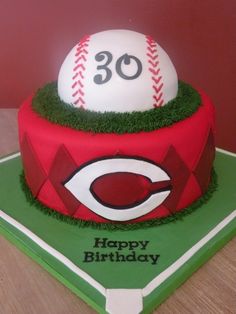 a baseball themed birthday cake with the number 30 on it