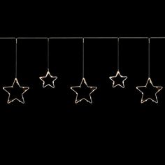 five stars hanging from the ceiling with one light on it's side and two in the