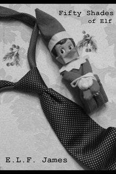 an elf's tie with the words fifty shades of elf on it