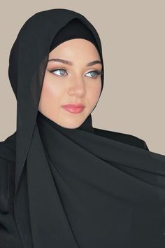 Our Luxury Chiffon Hijab-Black is perfect for every occasion. With the softest chiffon fabric we could find, our Luxury Chiffon will become your go to hijab whether you're going out to a fancy party or keeping it casual, looking beautiful is effortless!FABRIC & CAREFabric: Polyester Chiffon Dimension: 70"L x 27"WContour: Long RectangleThickness: LightTexture: SmoothFabric Care: Machine or hand wash in warm water, tumble dry or air dry, iron if needed.While we try our best to ensure product color Elegant Solid Color Wedding Abaya, Elegant Black Abaya For Formal Occasions, Elegant Black Formal Abaya, Elegant Evening Chiffon Abaya, Elegant Wedding Hijab, Elegant Solid Chiffon Hijab, Elegant Black Abaya, Elegant Solid Color Chiffon Hijab, Hijab Fabric