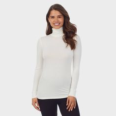 The ideal layer for everyday wear, Smooth Stretch provides warmth without the added bulk. Luxuriously soft to the touch, it is perfect for layering in any season. Made with spandex to effortlessly stretch with you for all day comfort. This long sleeve top features a soft turtleneck for additional warmth. Thermal Turtleneck, Layered Fits, Long Black Coat, Women Shirt Top, Teal Top, Grey Long Sleeve Shirt, Layered Shirts, Fitted Turtleneck, Cuddl Duds