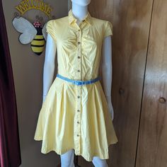 Yellow 50's Style Button Up Dress....With Pockets! What Could Be Better? Size L Women's, Cotton. I'd Say It Fits Like A Women's 8. Pretty Yellow Would Be Great For Summer Or Fall. Belt Can Be Interchanged With Attached Loops. Could Use A Bit Of An Ironing But Other Than That All My Clothes Come Washed And Ready To Go, From A Smoke Free Home. Not New With Tags, But In Excellent Condition. Yellow Button-up Cotton Dress, Yellow Cotton Button-up Dress, Fitted Vintage Summer Dress With Buttons, Fitted Vintage Dress With Buttons For Summer, Summer Vintage Cotton Dress With Buttons, Spring Vintage Cotton Dress With Buttons, Retro Dresses With Buttons For Day Out, Vintage Dresses With Button Closure For Day Out, Retro Button-up Summer Dress