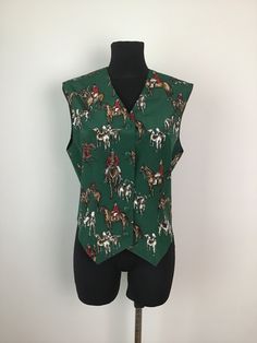 "Vintage Woman's Silk Forest Green Animal Print Vest  Fabric: 100% Silk. Vintage condition excellent. Tag Size: 42. Fits like Size L. Shown on mannequin Size S-M. Please rely on measurements. Measurements (lying flat): Length front: 24,8\"/ 63cm.                back: 21,3\"/ 54cm. Bust (armpit to armpit): 19,7\"/ 50cm. Waist: 18\"/ 45,5cm. Bottom: 18\"/ 45,5cm. Please double check measurements to insure a proper fit. Remember to allow yourself some extra room for movement. You can compare this with something from your closet that fits you well. Please note that color may slightly vary from photos. SHIPPING  I ship worldwide via Priority mail (Latvijas Pasts) from Latvia. I ship from Europe so please allow 2 to 4 weeks for the package to arrive if you live overseas. Europe 5-10 business day Botanical Print Vest, Animal Print Vests, Silk Vest, Velvet Vest, Green Animals, Vest Outfits, Extra Room, Womens Vest, Wearable Art