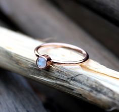 Minimalist Rainbow Moonstone Ring - Moonstone Ring - Birthstone Ring - Rose Gold Plated Ring - Handmade 925 Silver Ring Gift For Her Ring Description:✍ Stone name - White  rainbow Moonstone Birthstone Handmade jewelry Gift to her Stone- Moonstone  Shape - as shown these  image Round Cut Color  - white and blue flash  Metal- 925 silver and Stone used Silver Weight - 1.50 to 2 gram Approx ( Depend on the size) Grade - Faceted  Purity 100% Type- Natural Silver  weight - 2 gram approx Note - Would you like to ask any question Feel freely ask don't be hesitate. Minimalist Moonstone Promise Ring With Bezel Setting, Minimalist Moonstone Ring With Bezel Setting For Promise, Minimalist Moonstone Ring, Minimalist Moonstone Stackable Promise Rings, Minimalist Moonstone Bezel Set Promise Ring, Handmade Minimalist Moonstone Promise Ring, Adjustable Minimalist Moonstone Ring, Minimalist Rose Gold Moonstone Promise Ring, Gift Minimalist Moonstone Ring