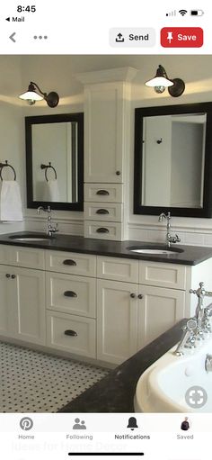 a bathroom with double sinks and two mirrors on the wall next to a bathtub