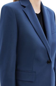 Cut from a rich wool blend with a touch of stretch, this handsome blazer boasts a modern slim fit for polished style. 23 1/2" length (size 8) Front button closure Notched lapels Bracelet-length sleeves Chest welt pocket; front flap pockets Lined 96% wool, 4% elastane Dry clean Imported Classic Blue Career Suits, Blue Notch Lapel Blazer For Work, Modern Slim Fit Blazer For Office, Blue Single-button Blazer For Work, Blue Single Button Blazer For Workwear, Modern Slim Fit Office Blazer, Slim Fit Single Breasted Office Blazer, Slim Fit Single Breasted Blazer For Office, Office Blazer Single Breasted Slim Fit