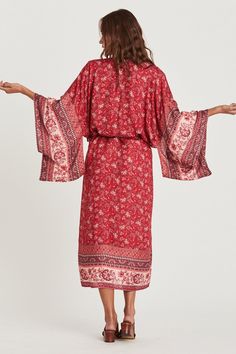 Behold a windswept bohemian beauty in Coa Kimono! Vibrant and floral sheer fabric flows to the beat of an artsy vibe. Thanks to its wing-like long sleeves and midi length, this kimono robe ensures full coverage for swim suit babes. Gracefully show your appreciation with Coa Kimonos as special bridal party gifts. Infuse down time with flower power. Details: bohemian style Coa Kimono long sleeves midi length matching waist sash colorful floral print fabric is sheer Fabric + Care: Rayon, Cotton blend. Machine wash with mild detergent. Tumble dry normal or line dry for best shape. Steam or iron to your liking. Coa Kimono, bohemian style fall outfit, cute fall outfit ideas, floral kimonos, pretty kimono robe, bridal party gifts, ShoptheKei.com Bohemian Long Sleeve Boho Dress With Floral Print, Long Sleeve Bohemian Boho Dress With Floral Print, Long Sleeve Bohemian Dress With Floral Print, Flowy Long Sleeve Spring Kimono, Long Sleeve Boho Dress As Beach Cover-up For Spring, Long Sleeve Boho Dress For Spring Beach Cover-up, Flowy Long Boho Dress With Floral Print, Long Sleeve Boho Dress For Beach, Summer Long Sleeve Robe For Brunch