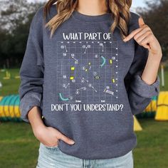 a woman wearing a sweatshirt that says what part of don't you understand?