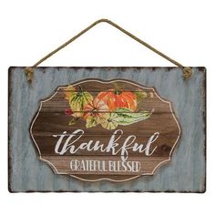 a wooden sign that says, thank you grateful with pumpkins and leaves on it