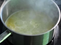 boiling water in a pot on the stove