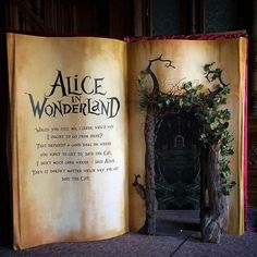 an open book with the words alice and the wonderland written on it's pages