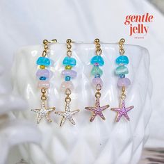 Add a touch of whimsy to your outfit with these adorable pastel stone starfish earrings! 🐚💫 #HandmadeJewelry 💖𝐎𝐕𝐄𝐑𝐕𝐈𝐄𝐖: 🧡 Earrings are made with an assortment of glass beads. 💙 Beads may vary slightly. 💚 This listing is for 1 pair of earrings. 💛 Please note that because the item is handmade/ or due to the lighting, it may differ slightly from those in the photos (please allow a 2% difference). ✨𝐇𝐢𝐠𝐡𝐥𝐢𝐠𝐡𝐭𝐬: ✨ Handmade craftsmanship: Each pair of earrings is meticulously h Ocean-inspired Starfish Charm Earrings, Handmade Ocean-inspired Star Earrings, Starfish Charm Dangle Earrings For Jewelry Making, Starfish Charm Earrings For Gift, Starfish Charm Earrings Gift, Gift Starfish Charm Earrings, Ocean-inspired Star Earrings For The Beach, Ocean-inspired Star Earrings For Beach, Star-shaped Ocean-inspired Earrings For Beach