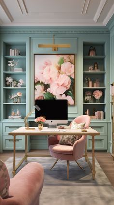 an office with blue walls and pink chairs in front of a computer monitor on a desk