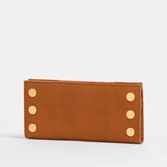 You can't cruise through DTLA without the 110 North. That's why we named our essential folding wallet after LA's fan-favorite freeway. This organizer's dream features 10 credit card slots, a transparent ID pocket, zippered pocket and two drop pockets to hold cash. Creativity and wearability collide in a true masterpiece: Meet our new Artist Tape collection. Our design team accented warm, saturated brown leather with a striking duo of crisp pink stripes. Meticulously straight, as if brought to li Modern Travel Wallet With Id Window, Modern Trifold Travel Wallet, Everyday Trifold Wallet With Snap Closure, Travel Bifold Wallets With Snap Closure, Versatile Travel Wallet With Snap Closure, Straight As, Gold Wallet, Heeled Mules Sandals, Lunch Tote