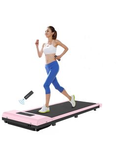 a woman running on a treadmill with an appliance for the monitor screen