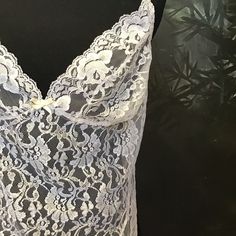 Women’s white, intimates. Very Good condition, size L (10 - 12) and M (6 - 8). Detailed measurements:Bust - 36 inchesWaist - 31 inchesHip - 34 inchesBody Length - 26 inchesI would love to see her paired with some high rise or low rise denim…meow! The length was measured without including the straps…the straps are 18” long. White Fitted Lace Camisole, White Fitted Camisole For Daywear, Fitted White Camisole For Daywear, Fitted White Camisole In Coquette Style, Elegant White Bra-friendly Camisole, White Fitted Sheer Camisole, White Sheer Fitted Camisole, White Fitted Camisole For Wedding, Elegant Fitted White Camisole