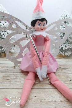 Elf wearing a fairy costume with a pink dress, a white sash, glittered wings, and a silver star wand Elf Fairy Costume, Elf Halloween Costume, Silver Halloween Costume, Whimsical Costume, Elf Halloween, Elf Fairy