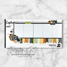 a white marble counter top with a planner page